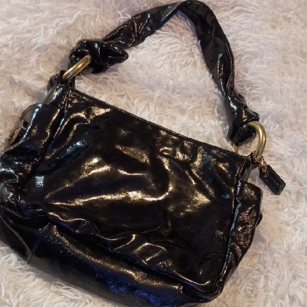 The Coach Ltd Resort Black Calf Leather Drawstring Shoulder Bag